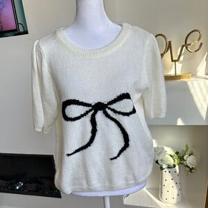 Anthropologie Cream Sweater with Black Bow